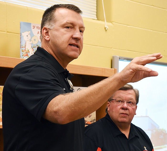 In this Sept. 18, 2015 file photo, superintendent Larry Linthacum addresses Jefferson City Public Schools issues with members of the local Chamber of Commerce while Bob Weber, director of school facilities, looks on.