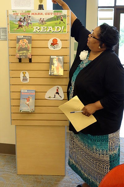 Sherry McBride wants children to join the summer reading program to avoid summer reading loss.