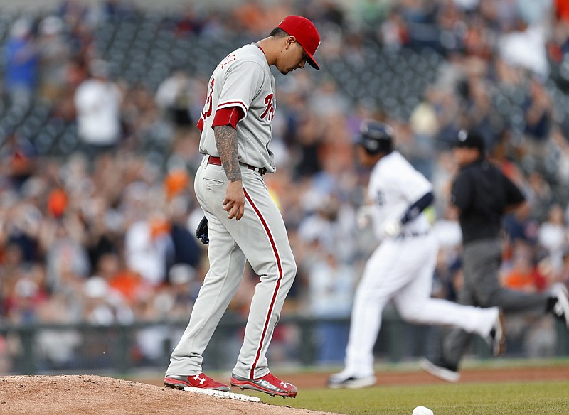 Philadelphia Phillies pitcher Vince Velasquez looks down as Detroit Tigers' Miguel Cabrera rounds third base after hitting a solo home run during the third inning Monday in Detroit.