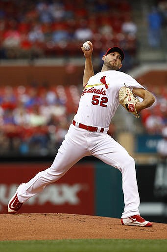 St. Louis Cardinals starting pitcher Michael Wacha throws during the first inning of a baseball game against the Chicago Cubs, Tuesday, May 24, 2016, in St. Louis. 