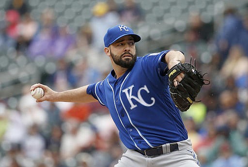 Kansas City Royals starting pitcher Dillon Gee delivers to the Minnesota Twins during the first inning of a baseball game in Minneapolis, Wednesday, May 25, 2016. 