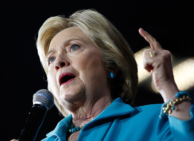 In this photo taken May 24,2016, Democratic presidential candidate Hillary Clinton speaks in Commerce, Calif. Hillary Clinton disregarded State Department cybersecurity guidelines by using a private email account and server, an internal audit found Wednesday, May 25, 2016. Her staff twice brushed aside specific concerns that she wasn't following federal rules. 