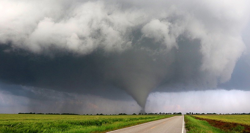 A tornado drops 2 miles northeast of Niles, Kan., on Wednesday, May 25, 2016. The large tornado that the National Weather Service said was on the ground for about 90 minutes damaged or destroyed about 20 homes in rural northern Kansas and came within a mile of hitting the small town of Chapman.