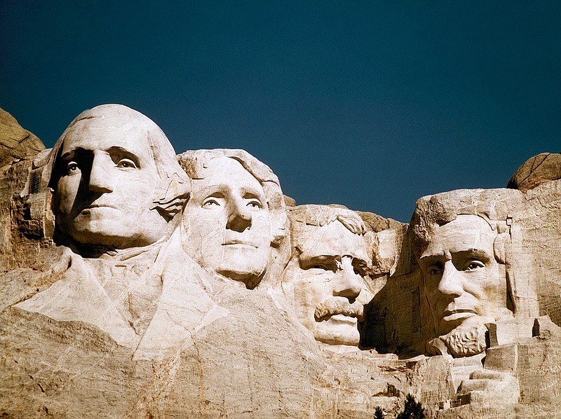 In this undated file photo, Mount Rushmore is shown in South Dakota. From left are George Washington, Thomas Jefferson, Teddy Roosevelt and Abraham Lincoln. The Partners in Preservation Campaign is asking the public to vote on 20 historic sites, including one at Mount Rushmore, that are vying for $2 million in preservation funding. The project at Mount Rushmore seeks $250,000 to restore structural elements of the Borglum View Terrace, where Rushmore sculptor Gutzon Borglum's original studio stood. 