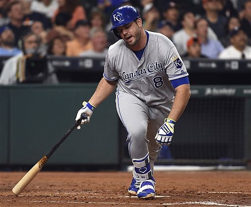 In this April 13, 2016, file photo, Kansas City Royals' Mike Moustakas reacts after flying out to end the third inning of a baseball game against the Houston Astros in Houston. 