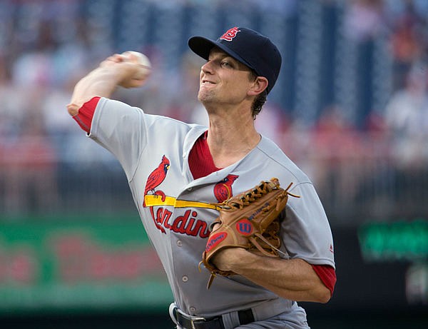 Cardinals starter Mike Leake delivers a pitch against the Nationals during the first inning of Thursday night's game at Nationals Park in Washington.