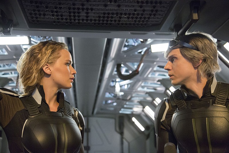In this image released by Twentieth Century Fox, Jennifer Lawrence, left, and Evan Peters appear in a scene from, "X-Men: Apocalypse."