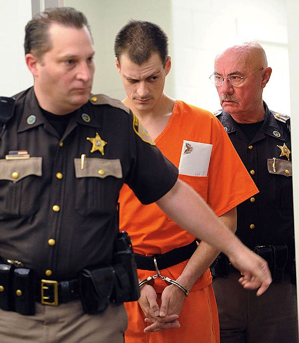 In this August 2014 photo, Nathaniel Kibby is escorted into court for a hearing in Carroll County Superior Court in Ossipee, New Hampshire.