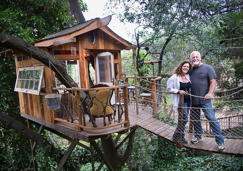 Homeowners Shelly and Steve Lange decided to create a grown-up treehouse for entertaining in their California garden that is built on a steep terraced hillside with big oak trees. Two decades ago, they started with a small deck and plain slab patio in a severely sloped weed-filled backyard. They turned that suburban challenge into this fantasy oasis.
