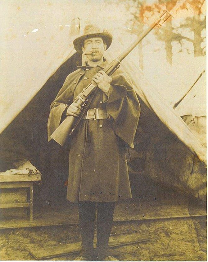 Jacob Houston is pictured in uniform in 1898 with a Krag-Jorgensen .30-40 rifle. A farmer from Miller County, Houston served as a private with Company B, Sixth Missouri Volunteer Infantry during the Spanish-American War.
