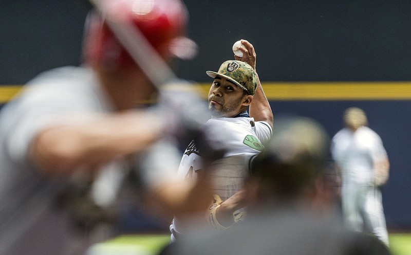 Milwaukee Brewers' Junior Guerra pitches to a St. Louis Cardinals batter during the first inning Monday in Milwaukee.
