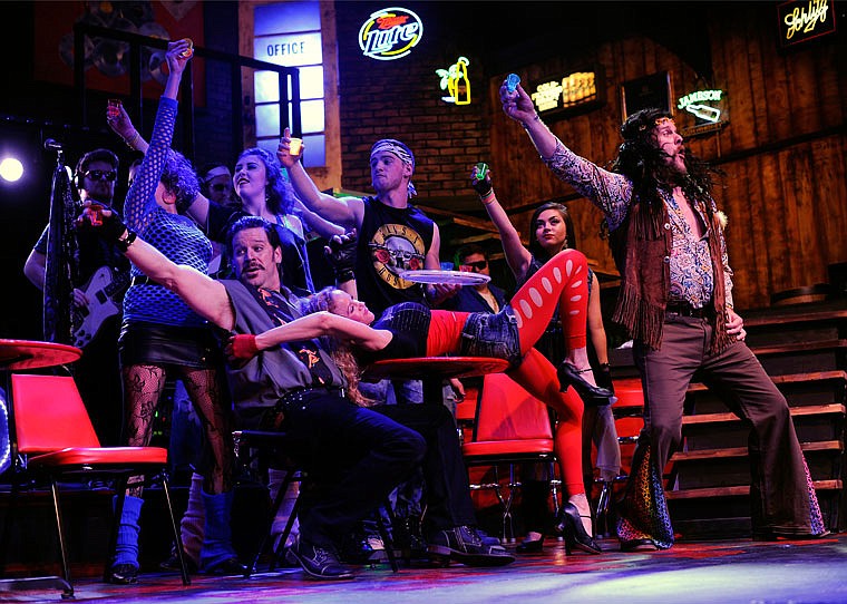 Cast members raise their shot glasses at the behest of Bourbon Room owner Dennis Dupree (right, played by Chris Bise) during a rehearsal for Capital Players' upcoming production of "Rock of Ages" at Shikles Auditorium.