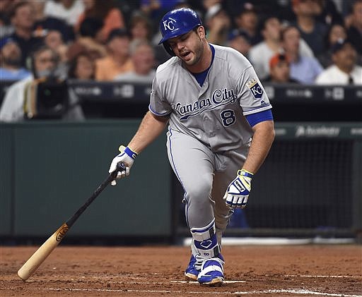 In this April 13, 2016, file photo, Kansas City Royals' Mike Moustakas reacts after flying out to end the third inning of a baseball game against the Houston Astros in Houston.