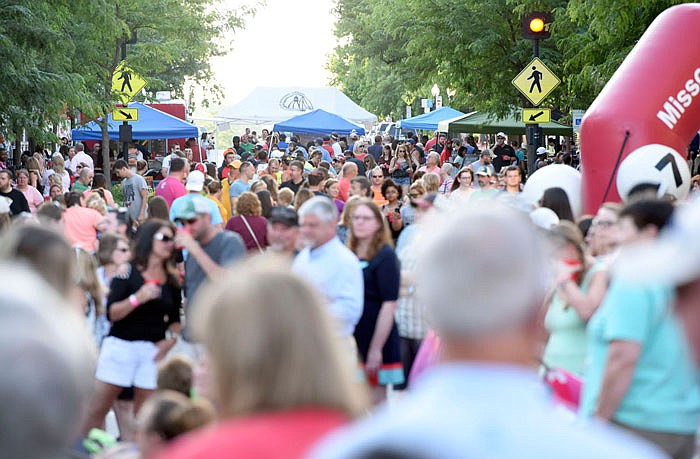 Attendees crowd the closed High Street during the first Thursday Live Night on High Street this summer. The concert is free to the public every Thursday in June.