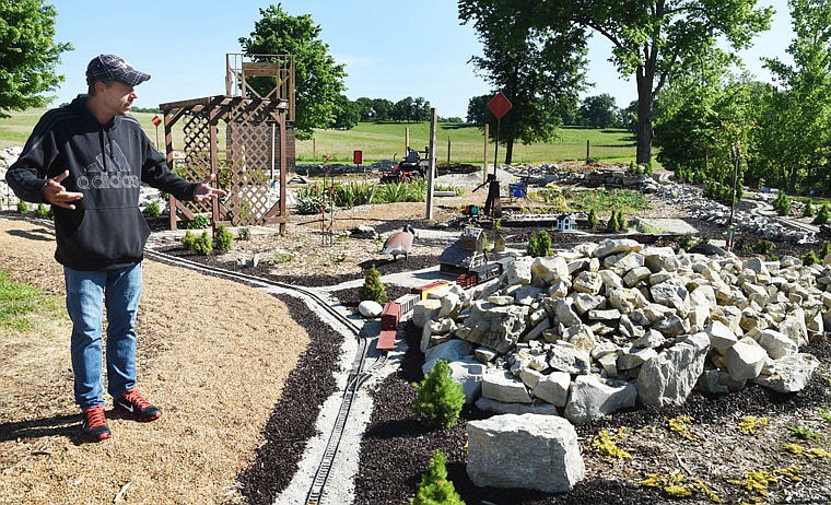 Randy Hackman talks about garden railroad layout and tells details the outdoor the section under construction at his home on Elston Road. He and his dad, Kenneth, have been working on their dream for a few years, and this weekend will see its grand opening.