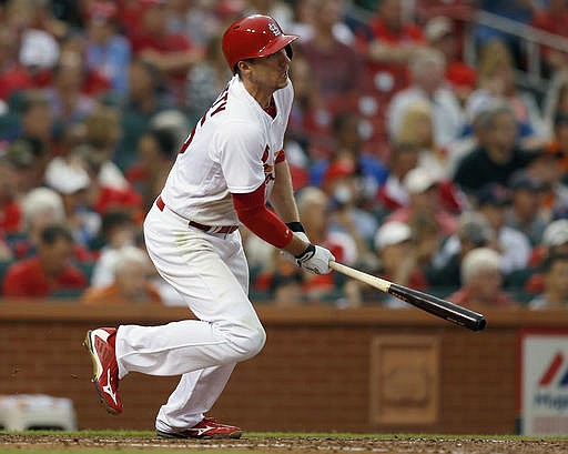 St. Louis Cardinals' Stephen Piscotty follows through on a RBI single during the third inning of a baseball game against the San Francisco Giant Friday, June 3, 2016 in St. Louis.