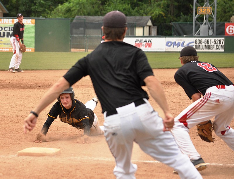 Fulton junior center fielder Josh Quick slides headfirst into third base in the third inning of Saturday's Class 4 third-place game against Aurora at CarShield Field in O'Fallon. Quick eventually scored as part of Fulton's four-run outburst in the inning, but the Hornets fell to the Houn Dawgs in a 10-6 loss.