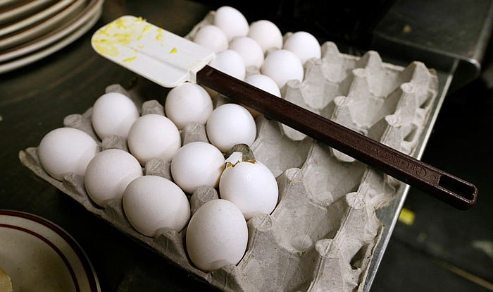 Eggs wait to be cooked at a cafe in Des Moines, Iowa. The U.S. Food and Drug Administration resumed inspections last week of egg-handling facilities in 21 states more than a year after they were suspended due to the nation's worst bird flu outbreak.
