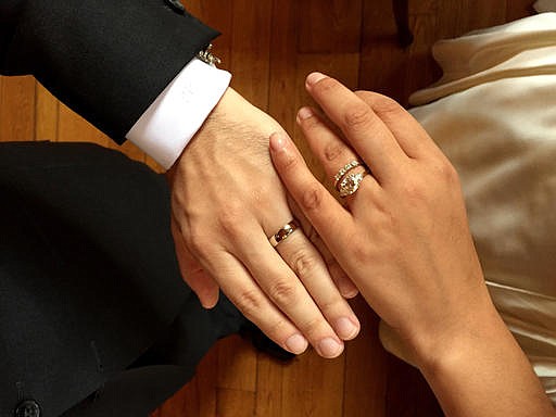 This Sept. 26, 2015, photo provided by Amber Marlow shows the ringed hands of Marlow and her husband, Marley Jay, after their wedding, in Stone Ridge, N.Y. The couple asked their wedding guests to stay off their phones during the ceremony and other key moments. In doing so, they hoped to make the celebration more enjoyable for everyone. 
