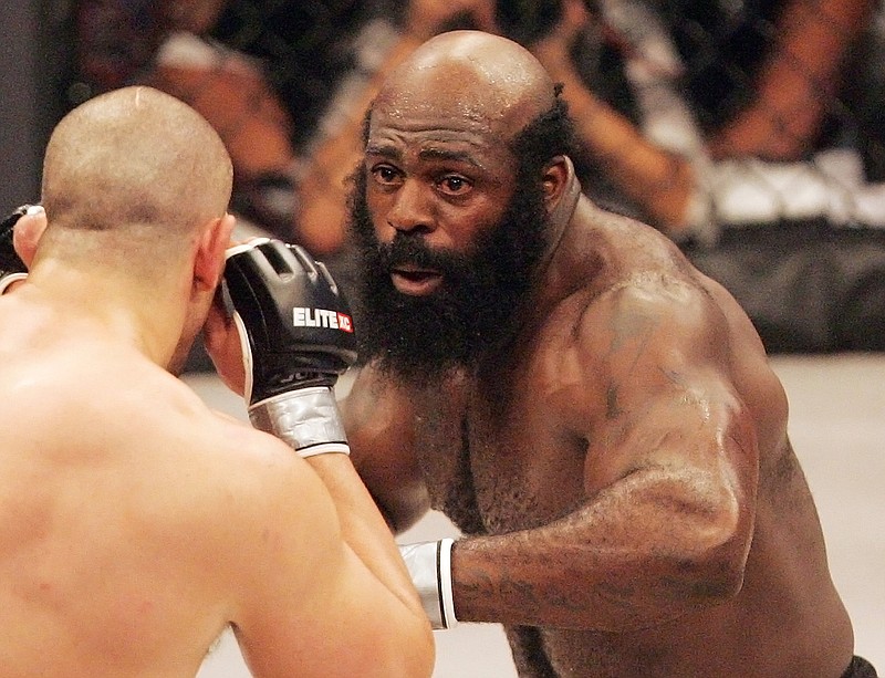 In this May 31, 2008, file photo, Kimbo Slice, right, battles James Thompson of Manchester, England during their EliteXC heavyweight bout at the Prudential Center in Newark, N.J. Kimbo Slice, the bearded street fighter who parlayed his internet popularity into a mixed martial arts career and worldwide fame, has died. He was 42. Slice, whose real name was Kevin Ferguson, was taken to a hospital in Margate, Florida, near his home Monday, June 6, 2016, Coral Springs Police Sgt. Carla Kmiotek said. Slice's death was confirmed by Mike Imber, his longtime manager.