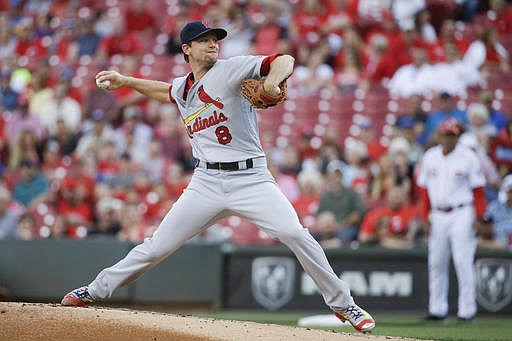 St. Louis Cardinals starting pitcher Mike Leake throws in the first inning of a baseball game against the St. Louis Cardinals, Tuesday, June 7, 2016, in Cincinnati.