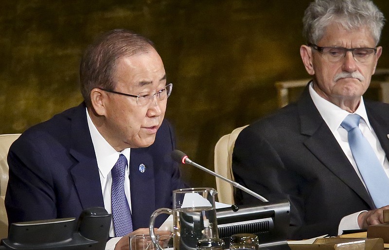 President of the U.N. General Assembly Mogens Lykketoft, right, listens as U.N. Secretary-General Ban Ki-moon address the opening of the General Assembly high-level meeting on ending AIDS, Wednesday June 8, 2016 at U.N. headquarters.