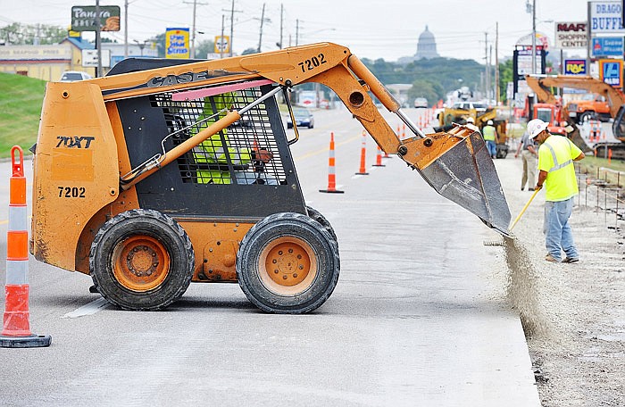 In this September 2013 file photo, work along Missouri Boulevard prepares for construction of sidewalks completed later that year. In 2016, additional projects have been slated and proposed to build or replace sidewalks along other parts of Missouri Boulevard.