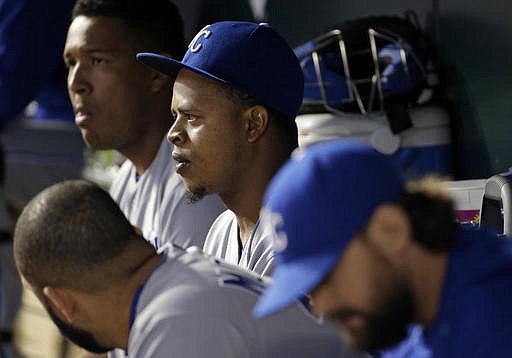 Kansas City Royals starting pitcher Edinson Volquez, center, sits in the dugout during the sixth inning of a baseball game against the Baltimore Orioles in Baltimore, Wednesday, June 8, 2016. Volquez was relieved in the fifth after Baltimore scored four runs. 