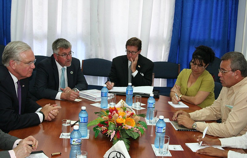 Missouri Gov. Jay Nixon (left), state Director of Agriculture Richard Fordyce and Missouri Director of Economic Development Mike Downing meet with officials in Cuba.