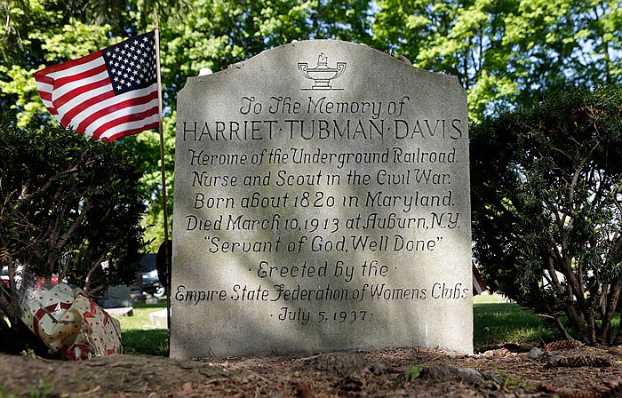 The inscription on Harriet Tubman's gravestone is seen at Fort Hill Cemetery in Auburn, N.Y. Tubman's upcoming debut on the $20 bill is just half the good news in the upstate New York town where the Underground Railroad conductor settled down and grew old. A long-sought national historical park here honoring Tubman could be officially established as early as this summer. 

