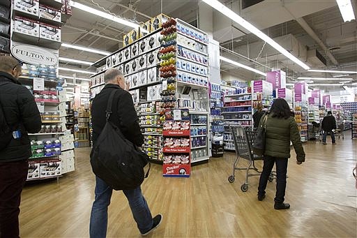  In this April 5, 2016, file photo, customers shop at a Bed Bath & Beyond, in New York. On Tuesday, June 14, the Commerce Department releases releases U.S. retail sales data for May.