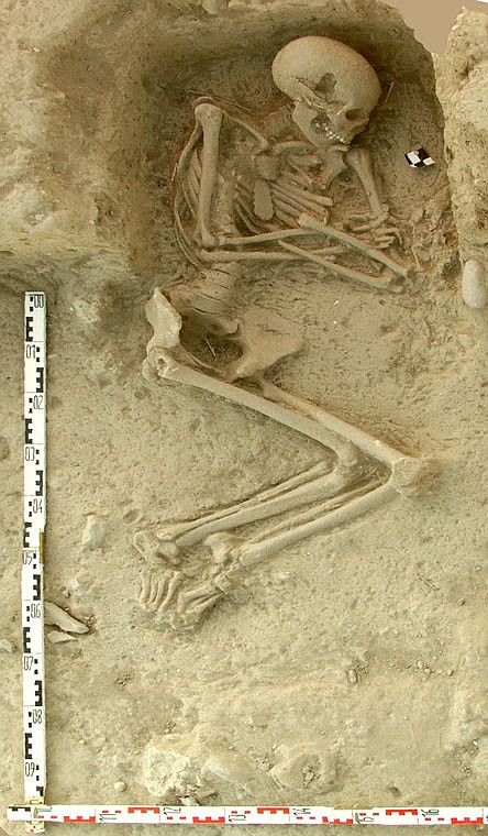 This undated picture shows a human burial from the archaeological site of Paliambela in northern Greece. Stone Age people from the Aegean region moved into central and southern Europe some 8,000 years ago and introduced agriculture to a continent still dominated at the time by hunter-gatherers, scientists say. 