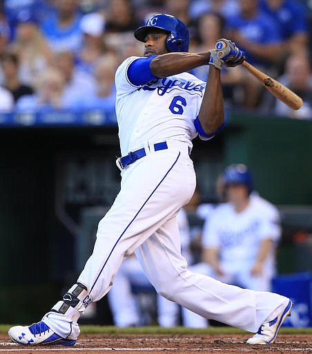 Kansas City Royals' Lorenzo Cain hits an RBI double off Cleveland Indians starting pitcher Corey Kluber during the first inning of a baseball game at Kauffman Stadium in Kansas City, Mo., Wednesday, June 15, 2016.