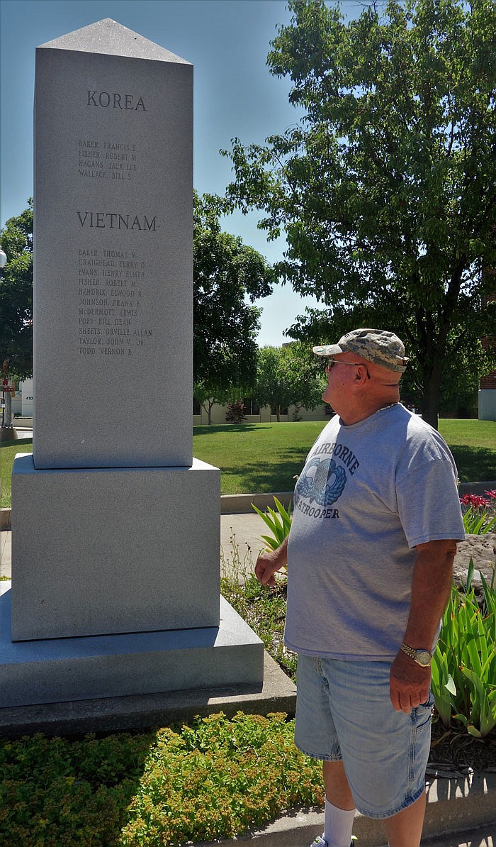 VFW Commander Larry Underwood looks at the Veterans Monument next to the Callaway County Courthouse.