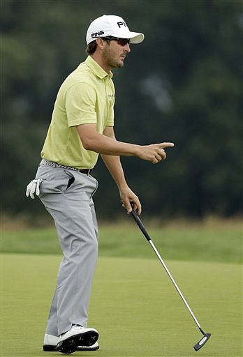 Andrew Landry waves after a birdie on the third hole during the first round of the U.S. Open golf championship at Oakmont Country Club on Thursday, June 16, 2016, in Oakmont, Pa.