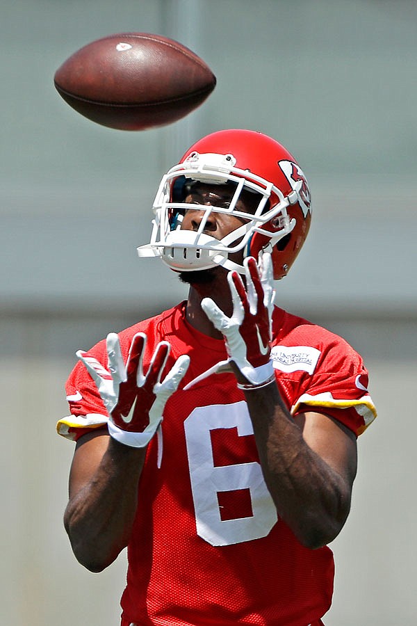 Chiefs wide receiver Kenny Cook participates in a drill during Wednesday's offseason practice in Kansas City. Cook suffered a torn quad injury this week at camp.