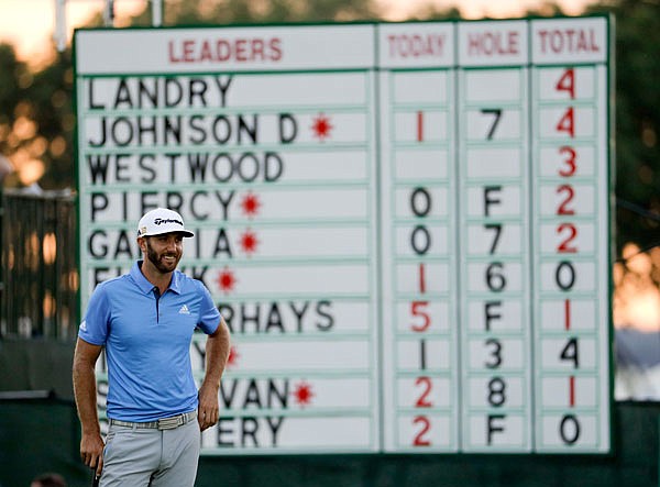 Dustin Johnson smiles on the ninth green Friday during the second round of the U.S. Open at Oakmont Country Club in Oakmont, Pa.