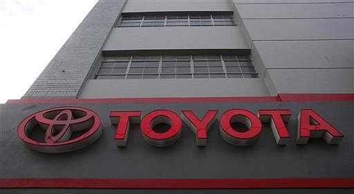 This Tuesday, Jan. 26, 2010, file photo shows the sign at a Toyota car dealership in San Francisco.