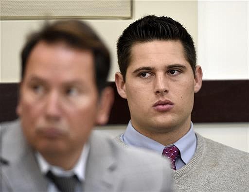 Brandon Vandenburg, right, a former Vanderbilt football player, listens during his rape trial Saturday, June 18, 2016, in Nashville, Tenn. (Larry McCormack, The Tennessean via AP)