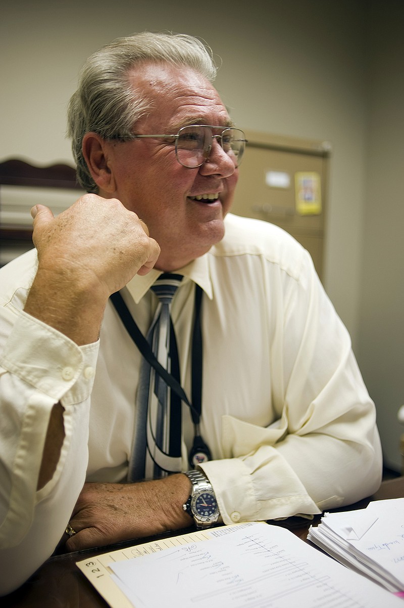 This photo taken Sept. 29, 2008, shows Johnny Bonds spending a few final hours in his office, in the Harris County Criminal Justice Center. The legendary district attorney's investigator is retiring.