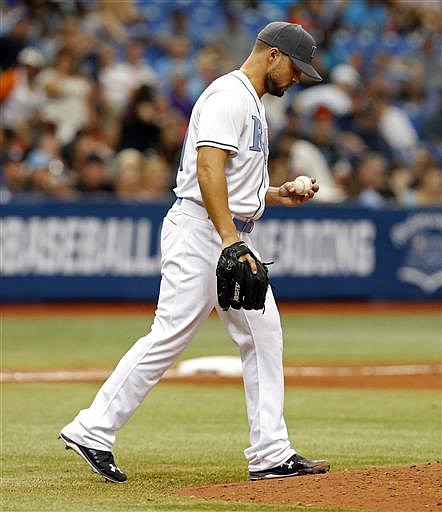 Tampa Bay Rays relief pitcher Xavier Cedeno reacts after giving up a single to San Francisco Giants' Joe Panik during the eighth inning of a baseball game Sunday, June 19, 2016, in St. Petersburg, Fla. 