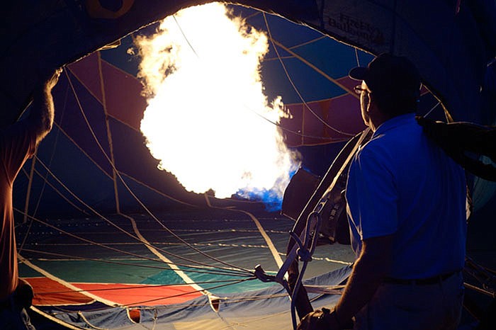 Gary Whitby, of Columbia, and his crew brought his hot air balloon, 'Boomer,' to the Balloon Glow during Friday night's Fulton Street Fair. 