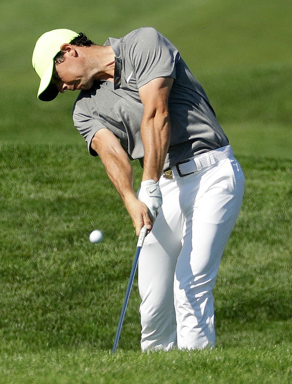 Rory McIlroy hits from rough on the 12th hole during Saturday's second round of the U.S. Open at Oakmont Country Club in Oakmont, Pa.