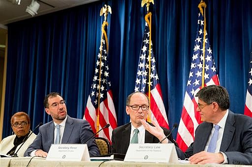 Treasury Secretary Jacob Lew, right, accompanied by, from left, Acting Social Security Commissioner Carolyn Colvin, Centers for Medicare and Medicaid Acting Administrator Andy Slavitt, and Labor Secretary Thomas Perez, speaks at a news conference at the Treasury Department in Washington, Wednesday, June 22, 2016, on the annual Social Security and Medicare Boards of Trustees report. 
