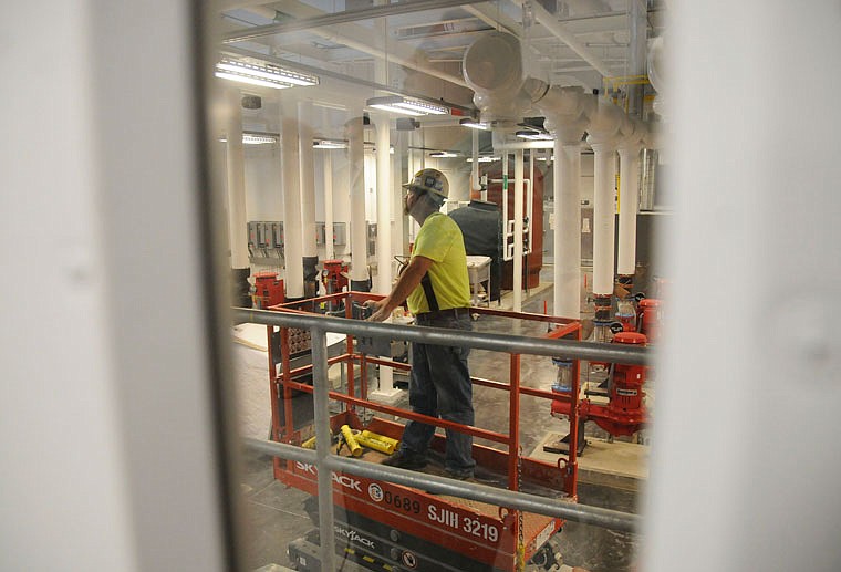 A construction worker with Three Rivers Construction works inside the Fulton State Hospital Energy Control Center on Thursday. Its the first part of the new hospital to be completed and will be attached to the main hospital, which includes 300 beds. 