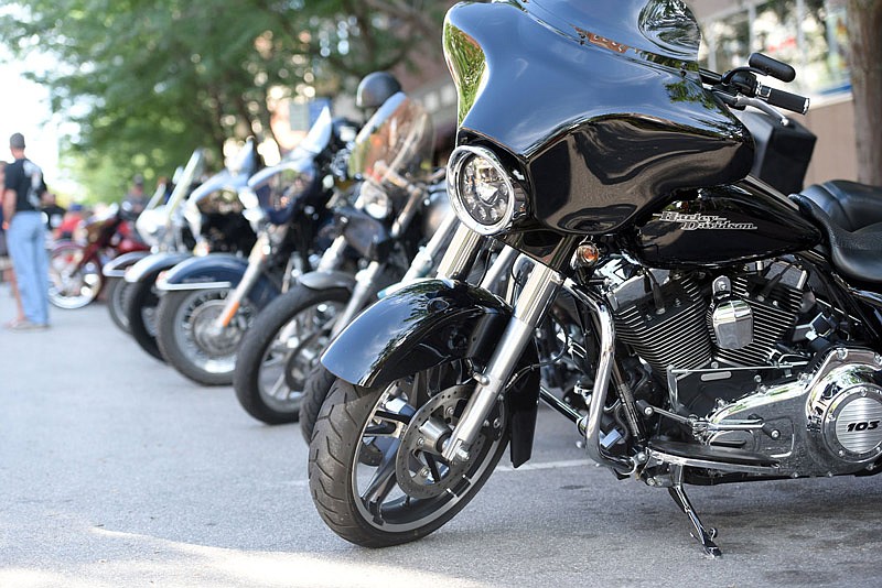 Providing the theme for Thursday Night Live, Harley-Davidson motorcycles were parked along High Street in downtown Jefferson City on Thursday, June 23, 2016.