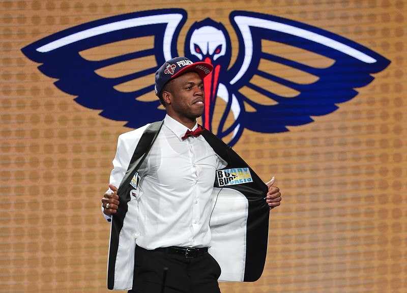 Buddy Hield reacts after being selected sixth overall by the New Orleans Pelicans during the NBA basketball draft, Thursday, June 23, 2016, in New York.