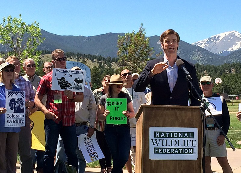 Collin O'Mara, CEO of the National Wildlife Federation, addresses attendees at a rally to show support for protecting national public lands. 