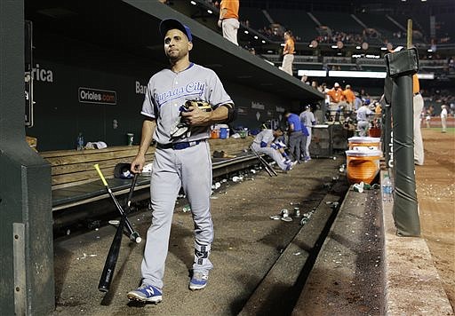 In this June 6, 2016, file photo, Kansas City Royals' Omar Infante walks out of the dugout after their 4-1 loss to the Baltimore Orioles in Baltimore. 