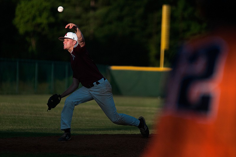  Texarkana Razobacks' Austin Cross throws against the East Texas Broncos on Friday, June 24, 2016 during the Brandon Warren Memorial Invitational at Joe Blagg Field in Ed Worrell Memorial Park.